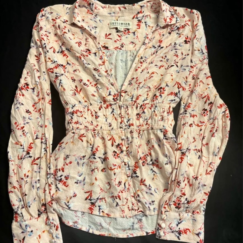 Floral blouse by Idylwild. 
Sold at Anthropologie for $120.